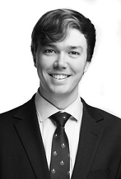 KELVIN BROWN Black and white headshot of Kelvin Brown