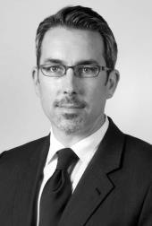 KENNETH J. RADDATZ, Partner Black and white headshot of Kenneth J. Raddatz