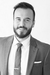 MARCIN J. PANASEWICZ Black and white headshot of Marcin J. Panasewicz
