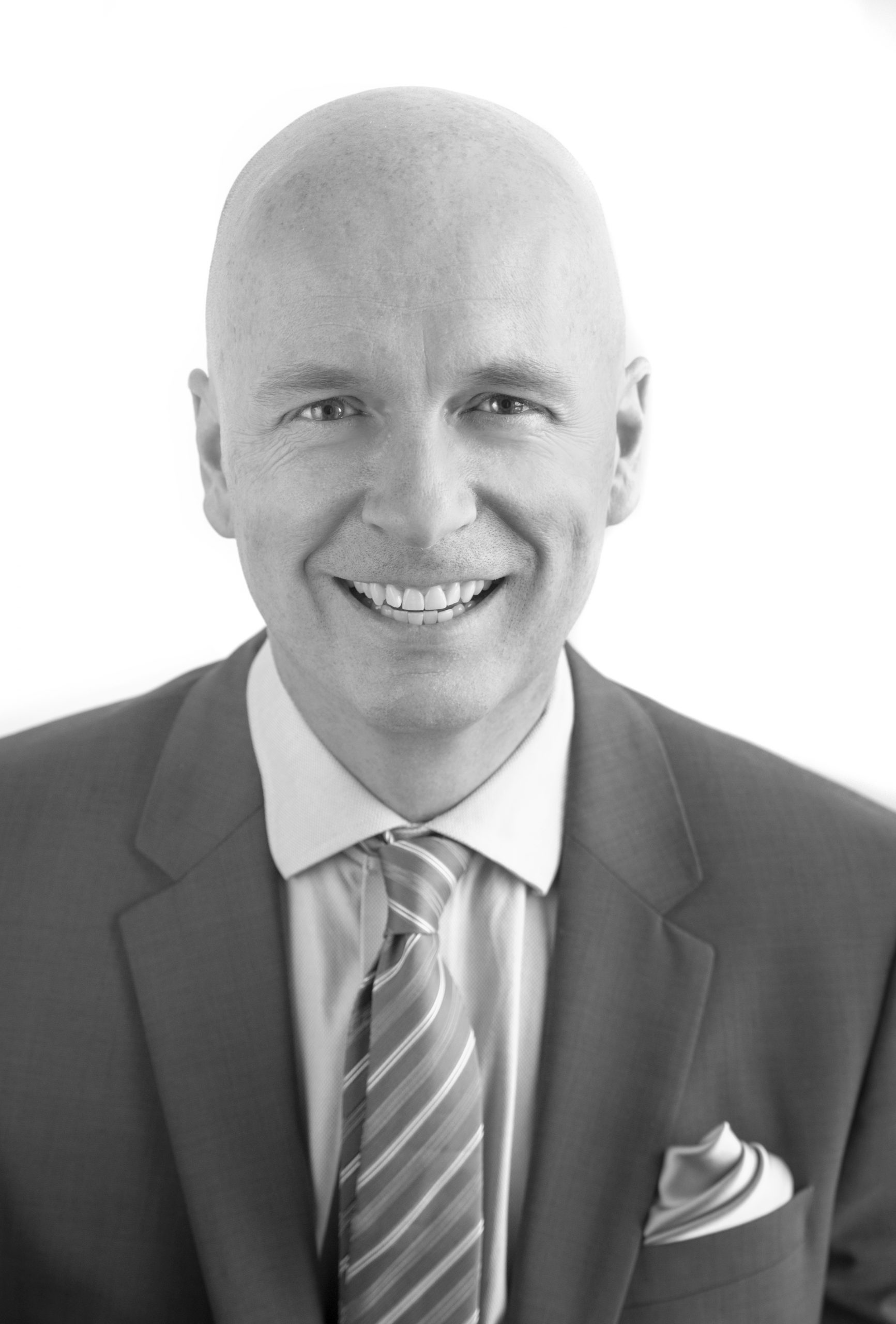 Black and white headshot of Kevin H. Griffiths