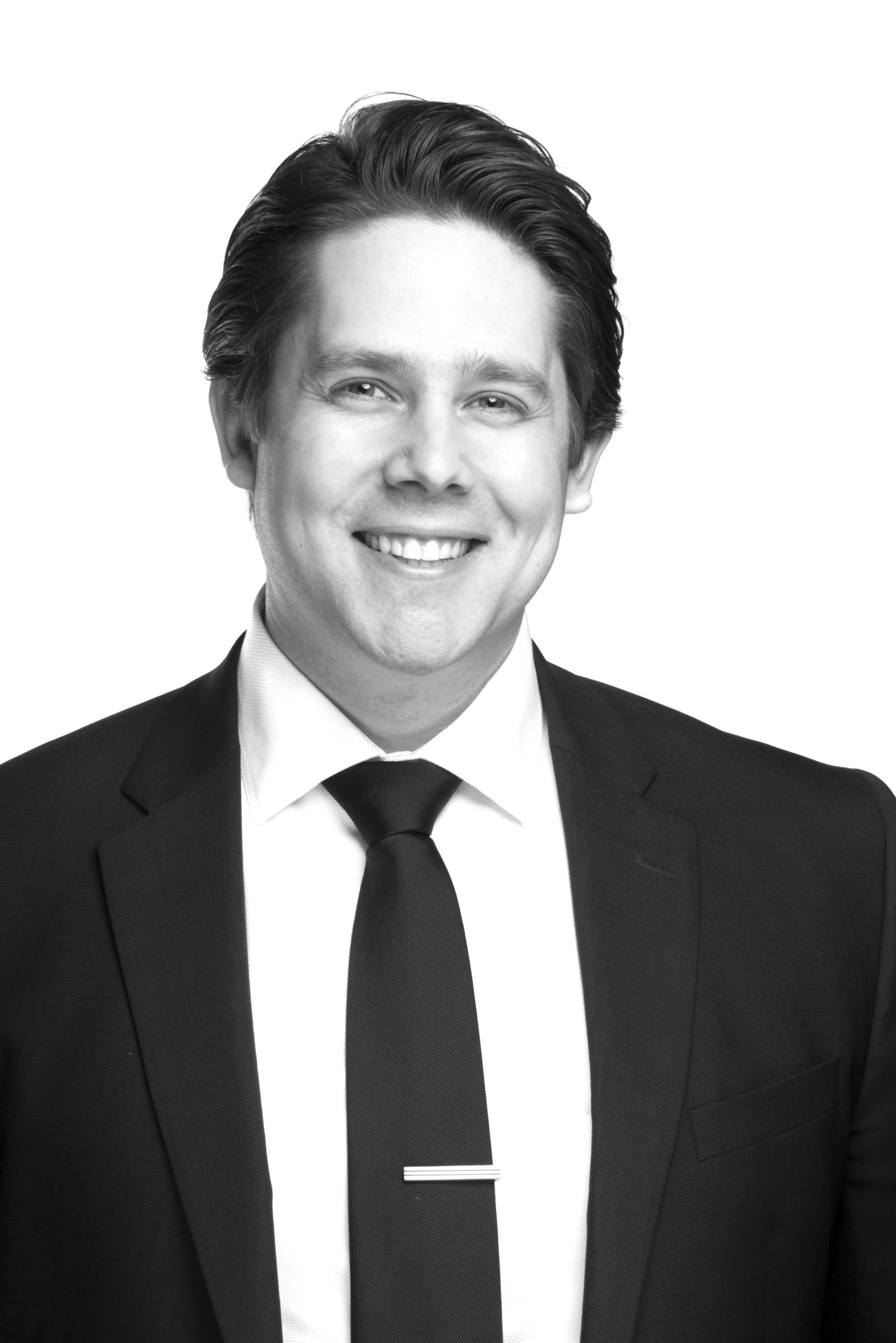 Kris Angle_final Black and white headshot of Kristofer B. Angle
