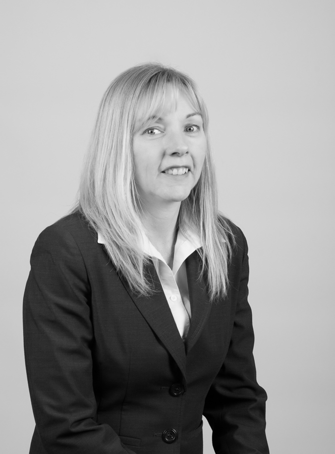 Black and white headshot of Leanne W. Zabudsky