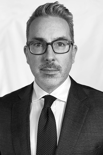 Black and white headshot of Kenneth J. Raddatz